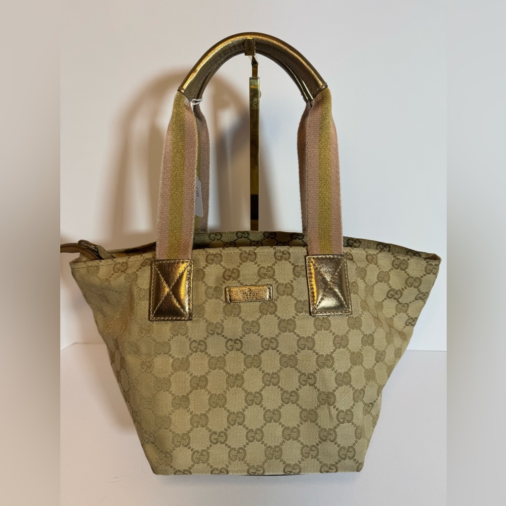 SOLD 

Gucci Beige and Gold Tote Bag